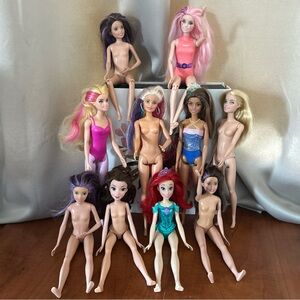 10 assorted fashion dolls, including several Barbie & Disney Princess characters